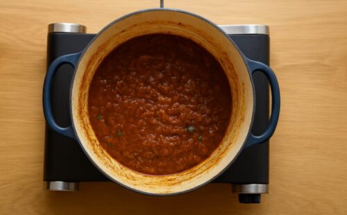 Chickpea-and-Spinach-curry-recipe-2 Mixing ground spices and green chilies into the onion base with water to form curry masala.