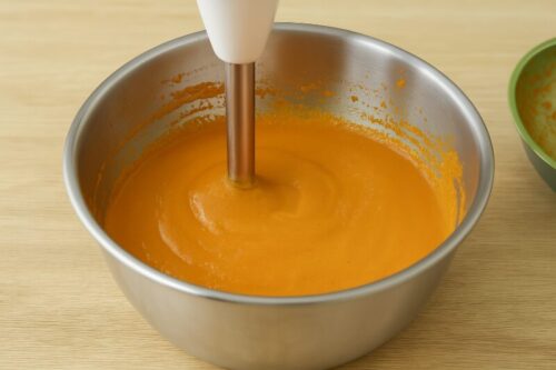 Indian-Butter-Chicken-4 Cooked gravy mixture being blended and strained for a smooth restaurant-style butter chicken base