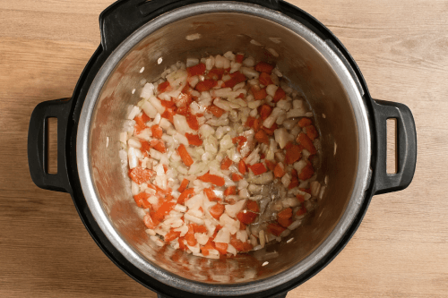 Saute diced onion and bell pepper