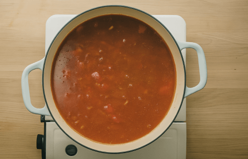 Step 3 - Add the lentils, tomatoes, vegetable stock.