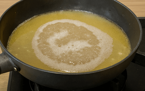 One-Pot Creamy Garlic Pasta - Add and boil butter and stock