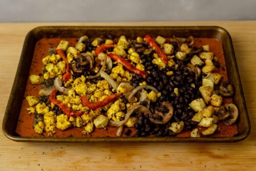 Veggie-Breakfast-Burrito-Bowl-3 Veggie burrito bowl ingredients roasting in oven at 180°C until golden and slightly crispy